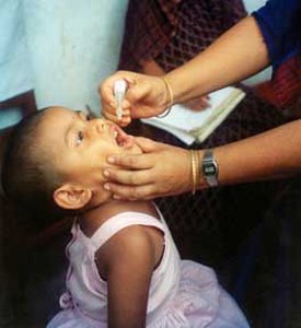 A child getting polio drops