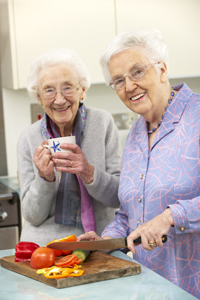 Two old ladys in a kitchen
