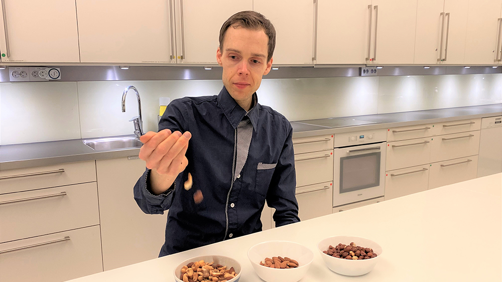 Erik Arnesen holding nuts