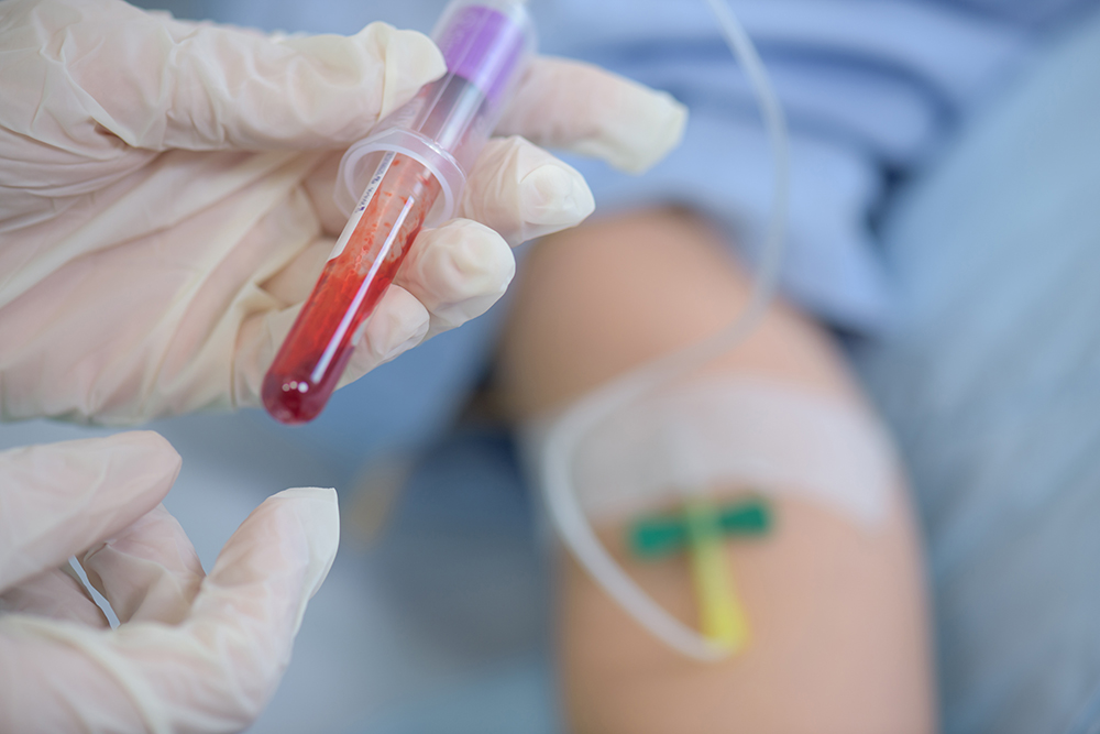 Image of a patient whose blood sample is being taken. 