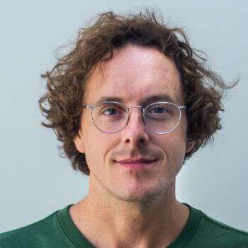 Portrait of Jonathan Frazer (man wearing glasses).