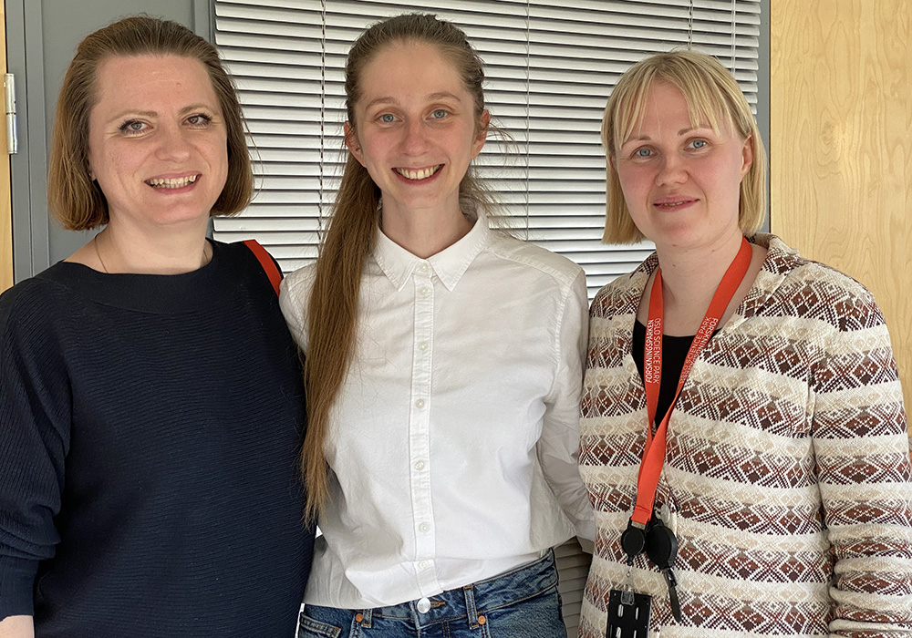 Dr Nikolina Sekulic (who has brown short hair and wears a black top), Dr Ganna Reint (who has long blonde hair and wears a white shirt) and NCMM Group Leader Dr Emma Haapaniemi (who has short blonde hair and wears a patterned top) on Ganna's disputation day